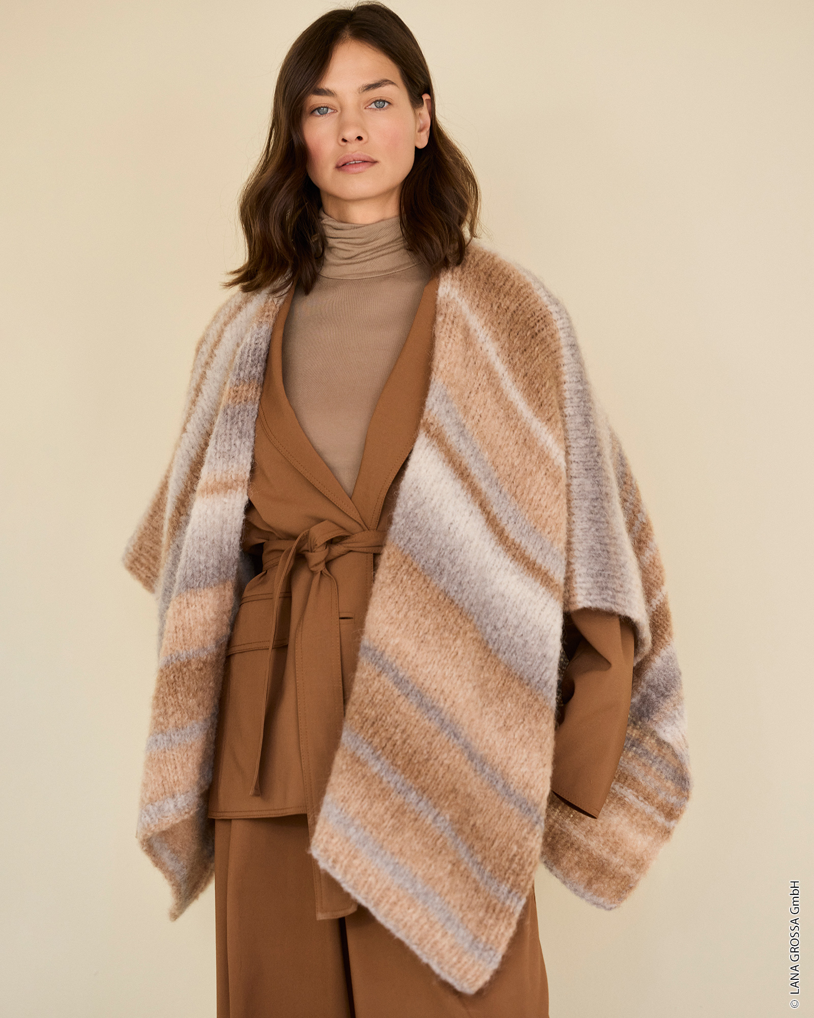 9231019_M21_S1-PONCHO - Gigante